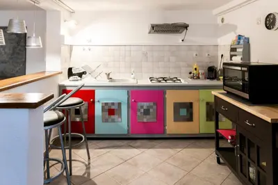 Cuisine ou kitchenette dans l'établissement Bas de villa, Haute-Corse, vue montagne, 5min des plages