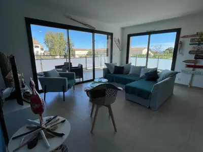 Coin salon dans l'établissement Les Toits de Moriani