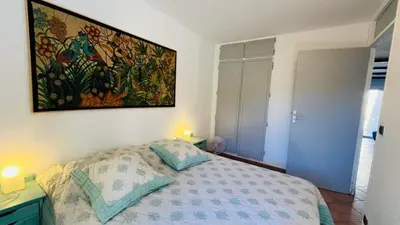 Un ou plusieurs lits dans un hébergement de l'établissement Appartement Cocody 41 LUMIO