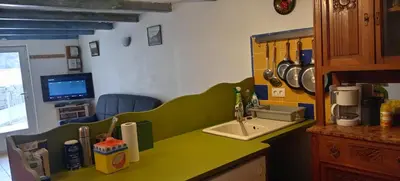 Cuisine ou kitchenette dans l'établissement NIOLU