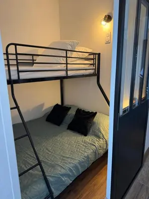 Un ou plusieurs lits dans un hébergement de l'établissement Appartement n 302 moriani plage