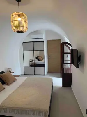 Un ou plusieurs lits dans un hébergement de l'établissement Authentique appartement vue montagnes avec grand patio et jacuzzi chauffé