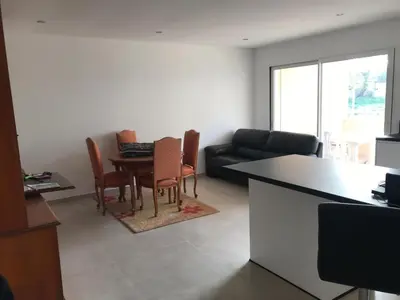Coin salon dans l'établissement Appartement à Ghisonaccia-Prunelli