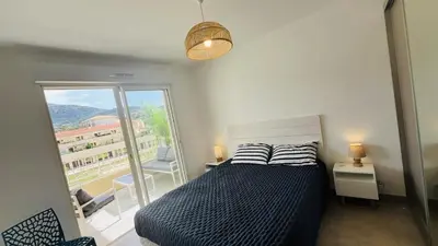 Un ou plusieurs lits dans un hébergement de l'établissement Appartement T3 A Marina 1 LUMIO