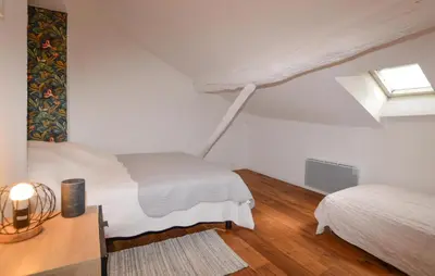 Un ou plusieurs lits dans un hébergement de l'établissement Beautiful Apartment In Bastia