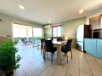 Coin salon dans l'établissement Appartement ALERIA 2/4 personnes