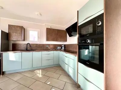 Cuisine ou kitchenette dans l'établissement Appartement ALERIA 2/4 personnes