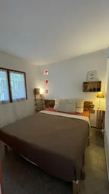 Un ou plusieurs lits dans un hébergement de l'établissement logement de charme en bord de plage