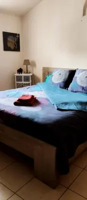 Un ou plusieurs lits dans un hébergement de l'établissement Villa les pieds dans l'eau