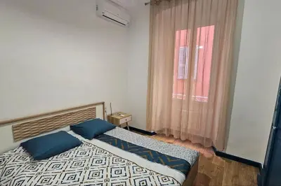 Un ou plusieurs lits dans un hébergement de l'établissement Appartement rénové centre historique de Bastia à deux pas du Vieux Port