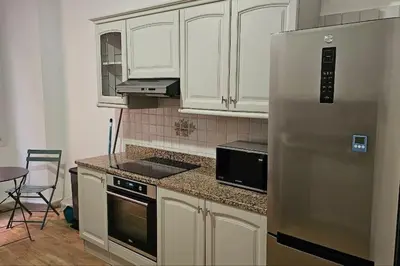 Cuisine ou kitchenette dans l'établissement Appartement rénové centre historique de Bastia à deux pas du Vieux Port