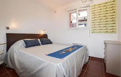 Un ou plusieurs lits dans un hébergement de l'établissement Awesome Home In Prunete With Wifi