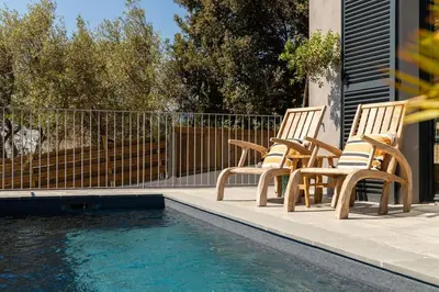 Piscine de l'établissement Belle villa vue mer- Erbalunga à 2 pas de la plage ou située à proximité