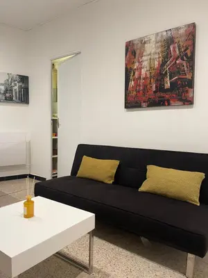 Coin salon dans l'établissement Appartement en plein Centre