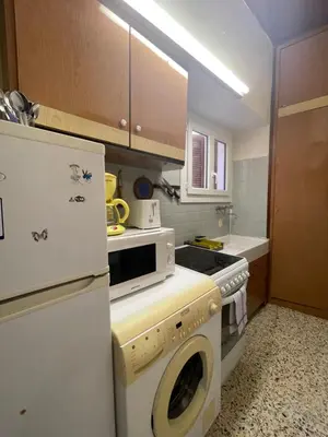 Cuisine ou kitchenette dans l'établissement Appartement en plein Centre