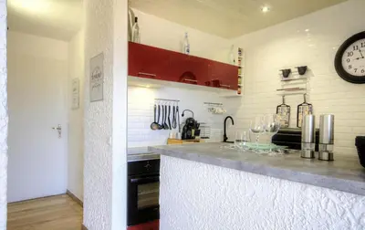 Cuisine ou kitchenette dans l'établissement Appartement 165