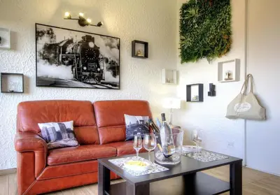 Coin salon dans l'établissement Appartement 165