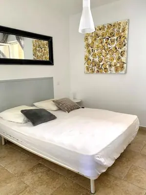 Un ou plusieurs lits dans un hébergement de l'établissement Appartement centre ville - 4p