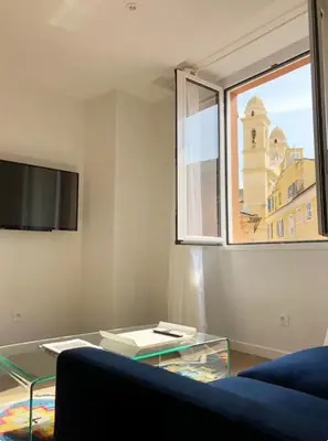 Télévision ou salle de divertissement dans l'établissement Terrazzo