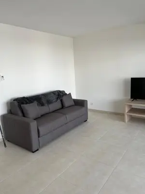 Télévision ou salle de divertissement dans l'établissement T2 CALVI