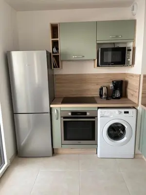 Cuisine ou kitchenette dans l'établissement T2 CALVI