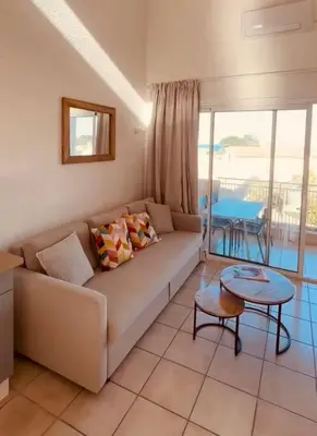 Coin salon dans l'établissement Charmant T2 rénové avec vue mer