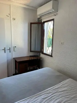 Un ou plusieurs lits dans un hébergement de l'établissement Maison les pieds dans l'eau