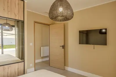Télévision ou salle de divertissement dans l'établissement Villa Vignarella