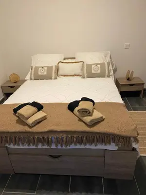 Un ou plusieurs lits dans un hébergement de l'établissement Appartement T2 rez de villa