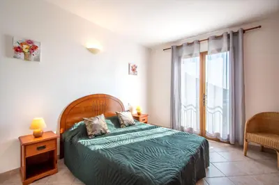 Un ou plusieurs lits dans un hébergement de l'établissement Appartement 4 personnes - vue mer