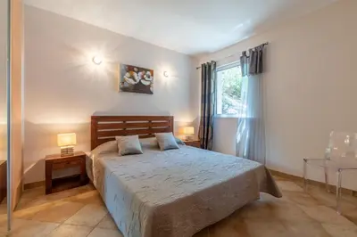 Un ou plusieurs lits dans un hébergement de l'établissement Appartement Privilège vue mer - Ile Rousse