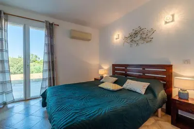 Un ou plusieurs lits dans un hébergement de l'établissement Duplex vue mer - Ile Rousse