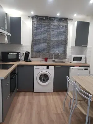 Cuisine ou kitchenette dans l'établissement Maison T2 500m de la plage