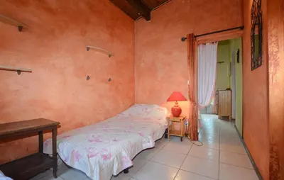 Un ou plusieurs lits dans un hébergement de l'établissement Lovely Apartment In Poggio Di Nazza