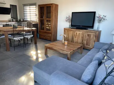 Coin salon dans l'établissement Belle Maison avec piscine Furiani