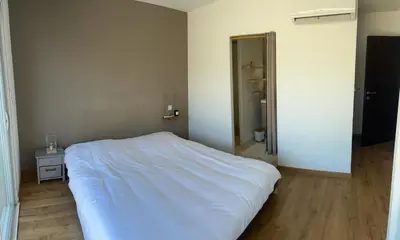 Un ou plusieurs lits dans un hébergement de l'établissement Maison de Vacances Avec Piscine Privée en Corse, BORGO