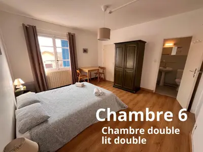 Un ou plusieurs lits dans un hébergement de l'établissement U pozzu hôtel