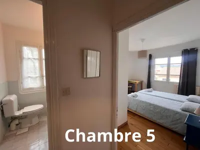Un ou plusieurs lits dans un hébergement de l'établissement U pozzu hôtel