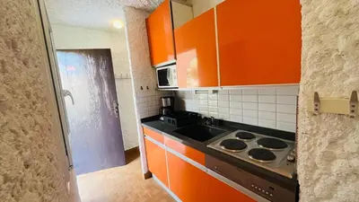 Cuisine ou kitchenette dans l'établissement Studio Cocody 84 LUMIO