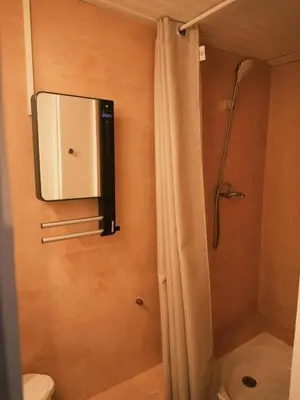 Salle de bains dans l'établissement Appartement à 2 mn a pied de la plage L'Ile Rousse Corse