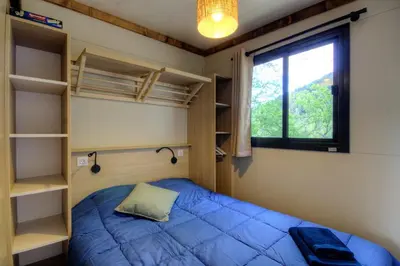 Un ou plusieurs lits dans un hébergement de l'établissement CHALET U Castagnu