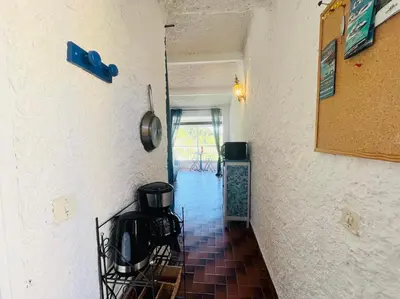 Cuisine ou kitchenette dans l'établissement Studio Cocody 49 LUMIO