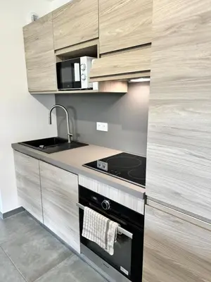 Cuisine ou kitchenette dans l'établissement Logement calme et agréable