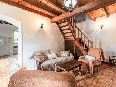 Coin salon dans l'établissement Holiday Home Piana by Interhome