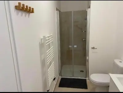 Salle de bains dans l'établissement T2 neuf vue mer, piscine chauffée N194