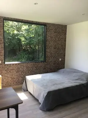 Un ou plusieurs lits dans un hébergement de l'établissement chalet 19m2 pour 2 personnes