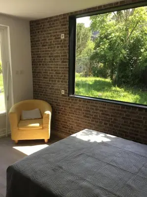 Un ou plusieurs lits dans un hébergement de l'établissement chalet 19m2 pour 2 personnes