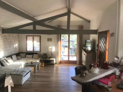 Coin salon dans l'établissement Maison de vacances