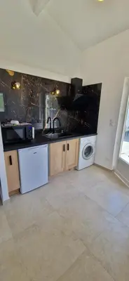 Cuisine ou kitchenette dans l'établissement Studio folelli entre le centre et la plage