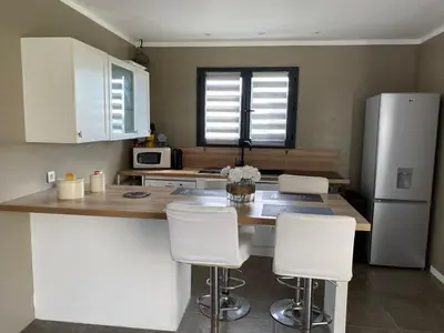 Cuisine ou kitchenette dans l'établissement Havre de paix